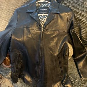 Leather jacket with zebra interior print